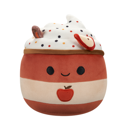 Apple pie plush toy with whipped cream, colorful sprinkles, a smiling face, an apple slice, and an embroidered apple on its striped body