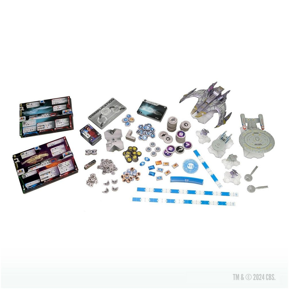 Star Trek board game components: miniature starships, player boards, cards, and numerous tokens on a white surface