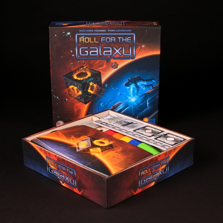 Laserox Inserts for Roll for the Galaxy, showing organized game components