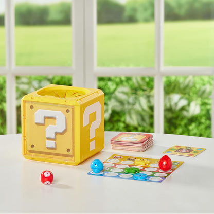 Super Mario Question Block game cube and colorful board game pieces displayed on a table