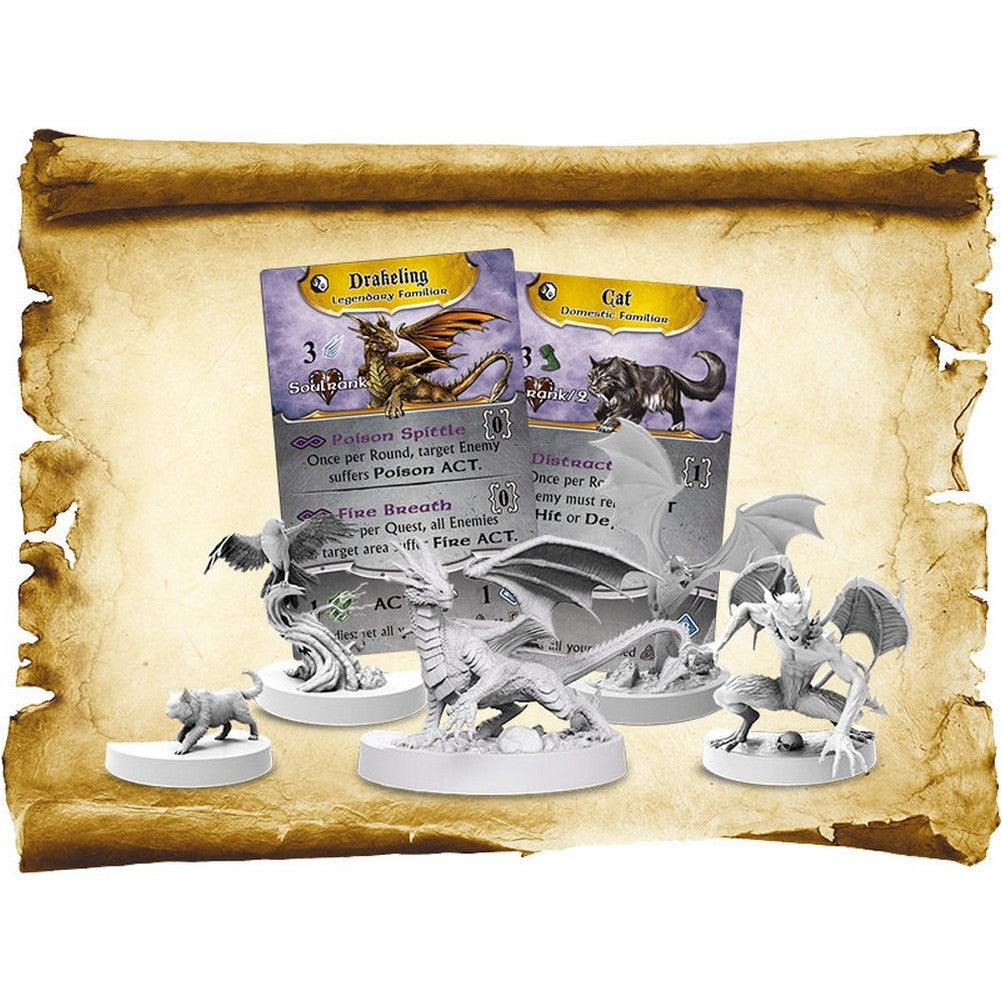 Gray unpainted fantasy board game miniatures, including dragons, a cat and a bird, with matching game cards on a scroll