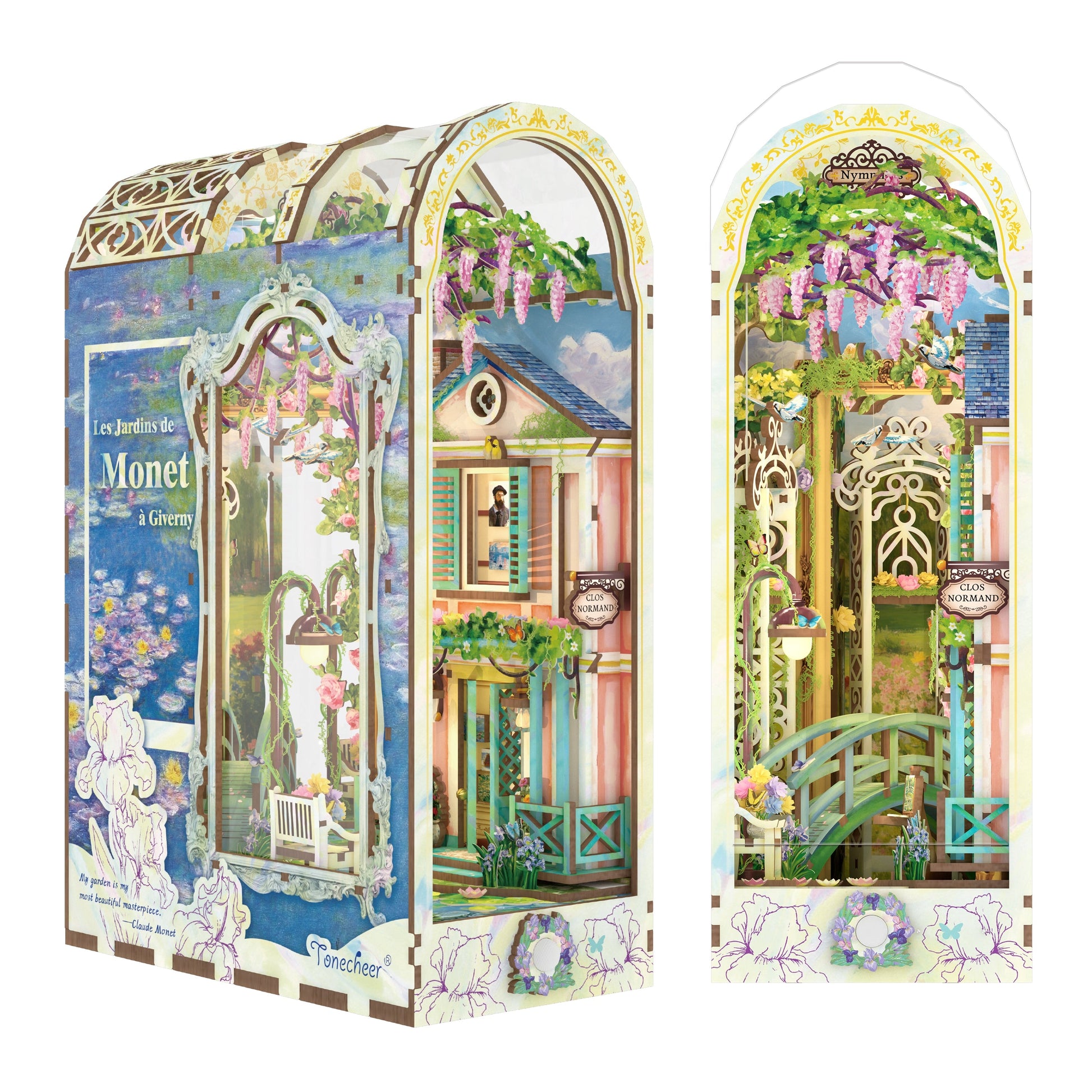Miniature 3D book nook diorama of Monet's Giverny garden, featuring a bridge and wisteria flowers