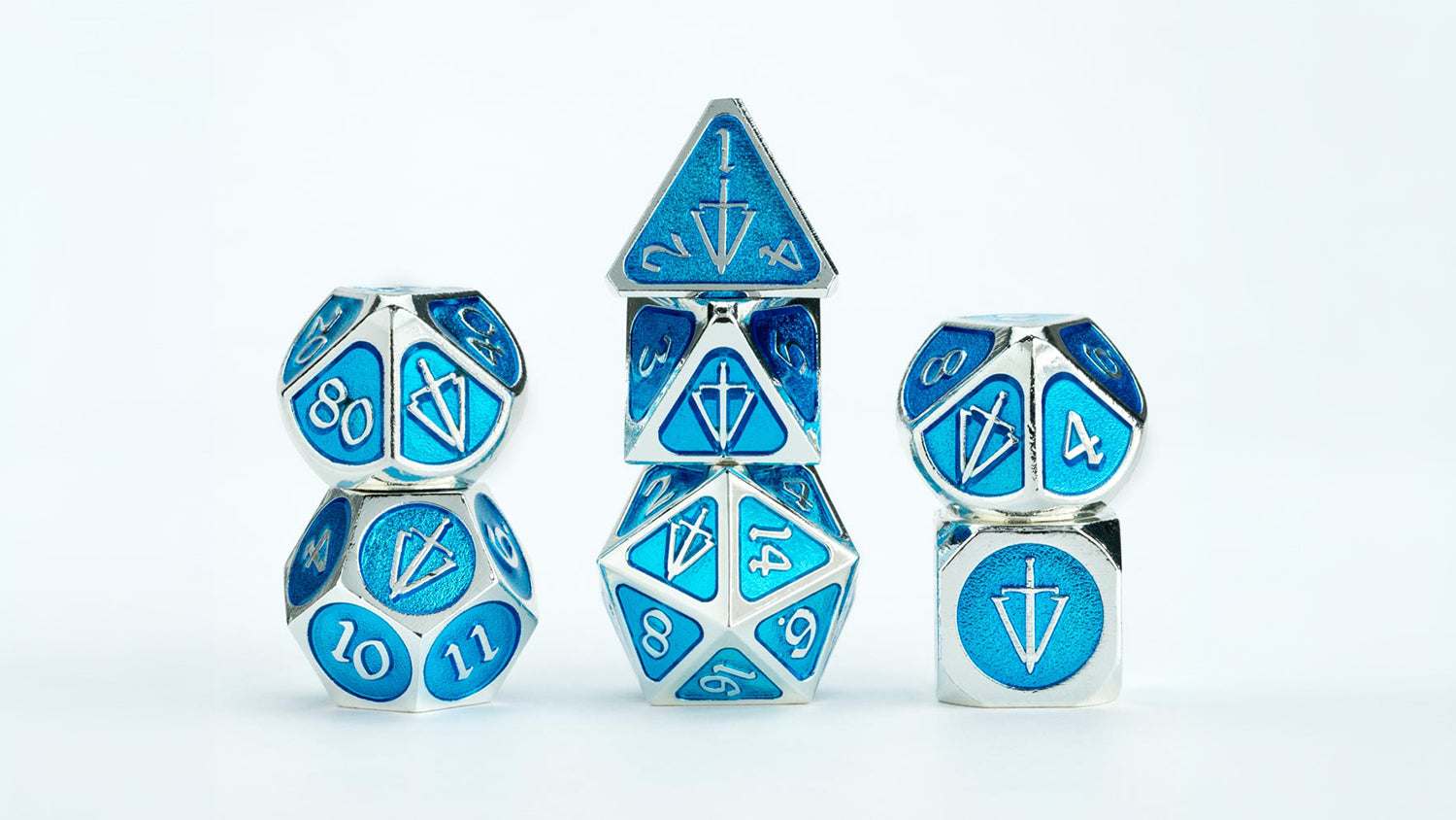 Tales of the Valiant metal dice set featuring gold and black finish