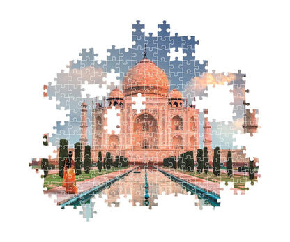 The Taj Mahal and reflection pool rendered as an incomplete jigsaw puzzle