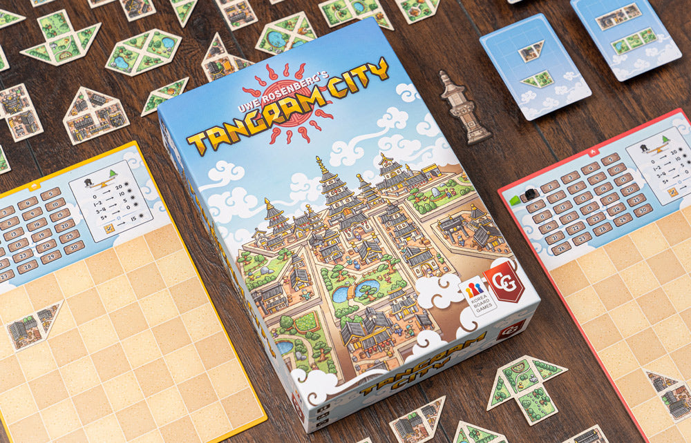 Tangram City setup with colorful polyomino tiles placed on a grid board during gameplay