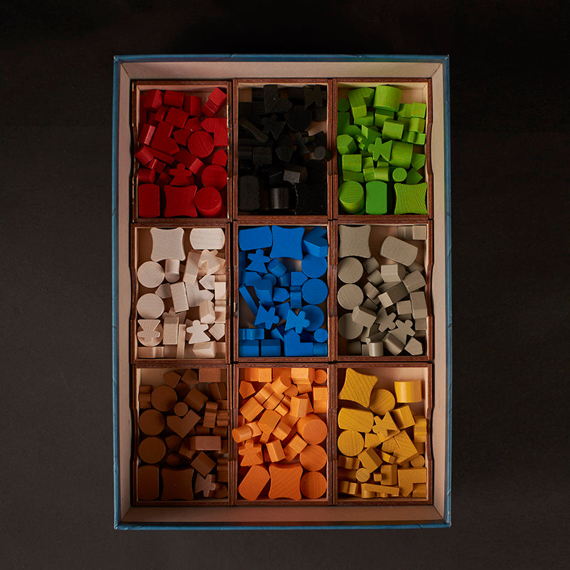 Terra Mystica game pieces stored in Laserox wooden insert compartments