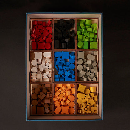 Terra Mystica game pieces stored in Laserox wooden insert compartments