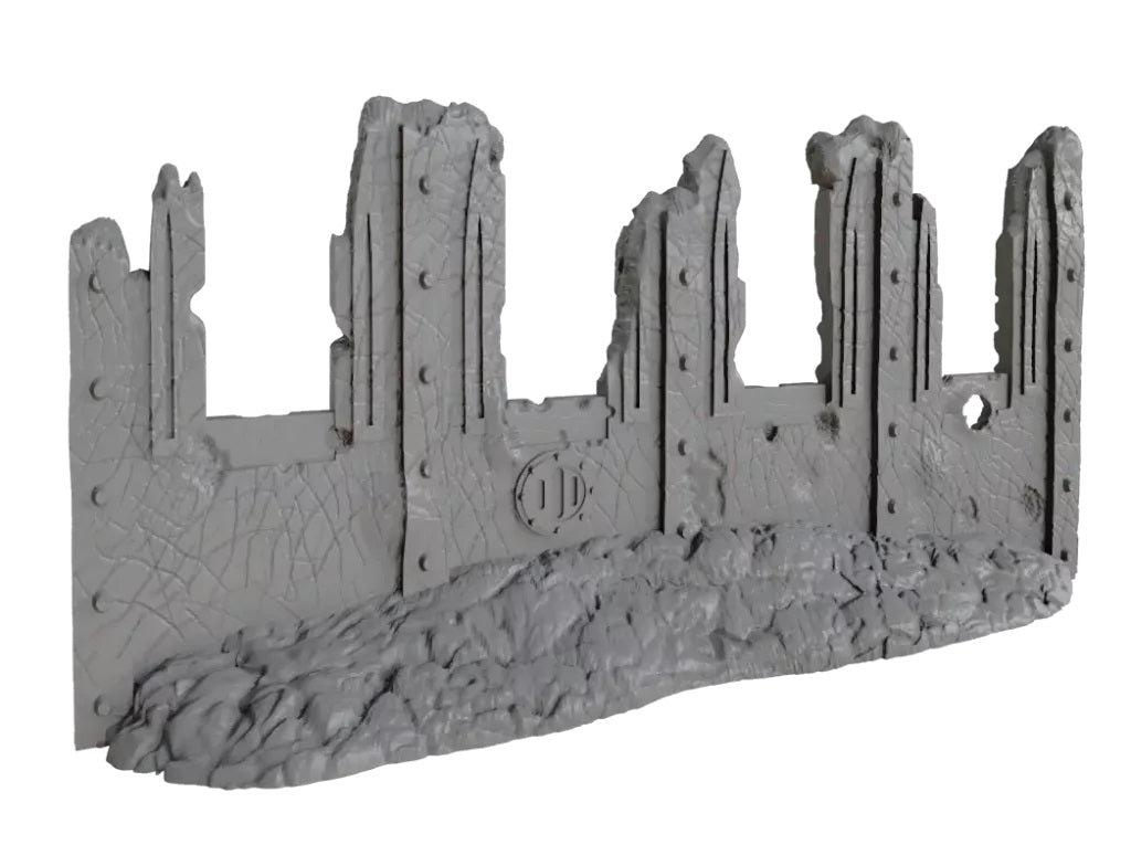 Grey miniature terrain: a ruined, jagged concrete wall with battle damage and rubble at its base