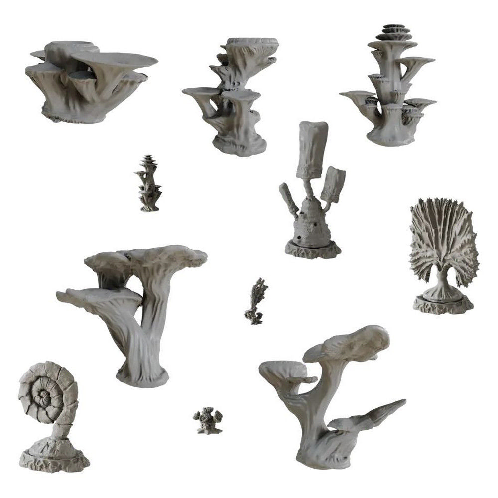 Multiple grey organic sculptures resembling alien plants, coral, and fungi on a white background