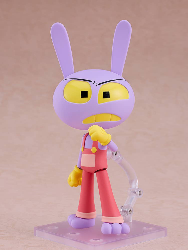 Purple rabbit figure with yellow eyes, gritted teeth, and red overalls, stands on a clear base
