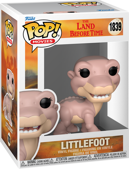 Light pink Littlefoot dinosaur Funko Pop figure displayed in its box, from The Land Before Time