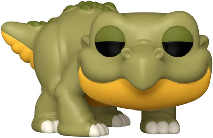 Green and yellow stylized dinosaur Funko Pop figure, with large black eyes, crouching forward