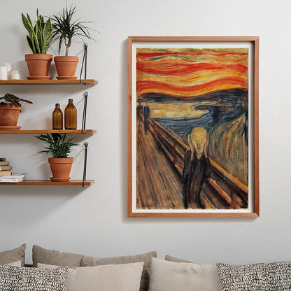 A framed print of Edvard Munch's "The Scream" painting hangs on a wall in a living room, above a couch