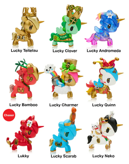 Nine vibrantly colored Tokidoki Unicorno figures, each uniquely themed like gold, clover, or a lucky cat, are displayed