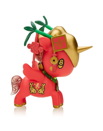 Red Tokidoki Unicorno figure with a gold helmet, small wings, Chinese fortune character, fish symbols, and a sparkly tail