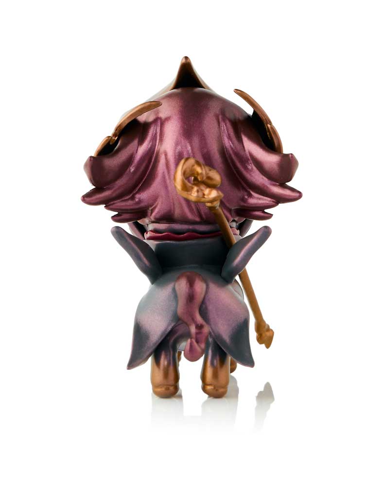 Back view of a stylized figurine with metallic purple hood-like top, a gold staff, and grey-purple lower body with gold legs