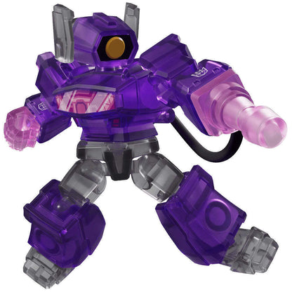 Translucent purple Transformers Shockwave robot figure with clear grey parts, a single yellow eye, and an arm cannon