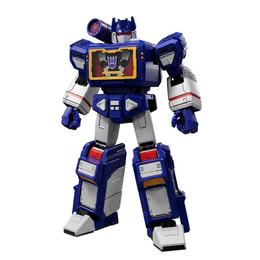 Blue, white, and red Soundwave Transformer action figure standing, features a cassette player chest with a Decepticon symbol and a shoulder-mounted cannon