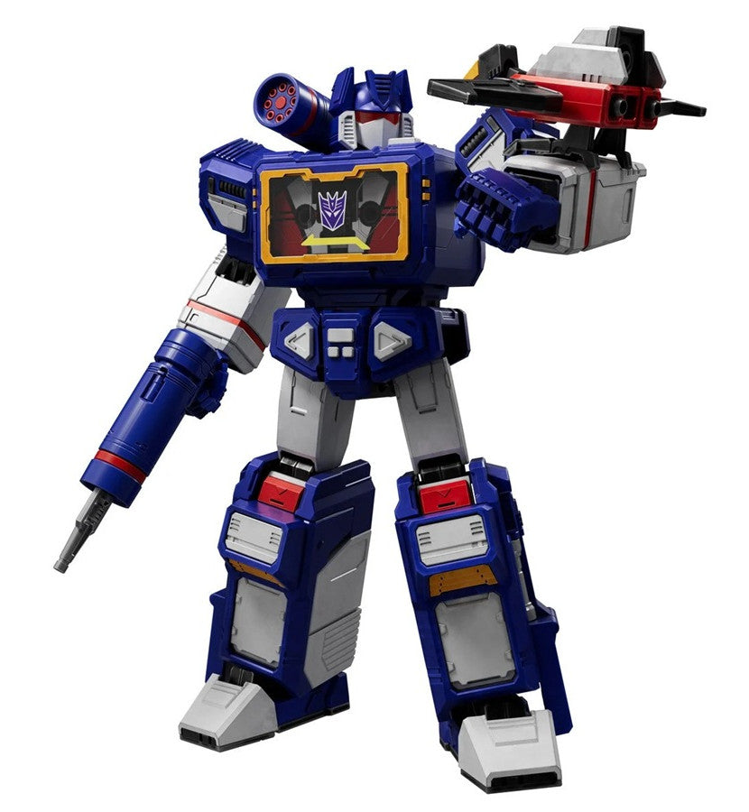 Blue and white Transformers G1 Soundwave figure with shoulder cannon, Decepticon symbol on cassette player chest, holding a red and black transforming cassette-bot