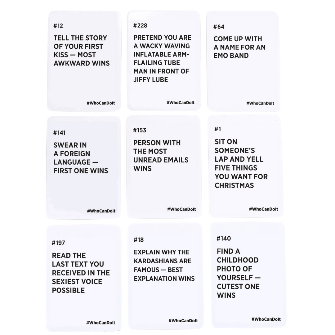 Game cards from Who Can Do It spread out on surface