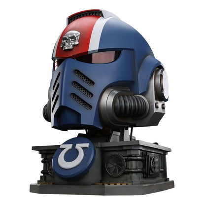 Blue Ultramarine Space Marine helmet bust with red and white stripe, silver skull, and Omega symbol on base