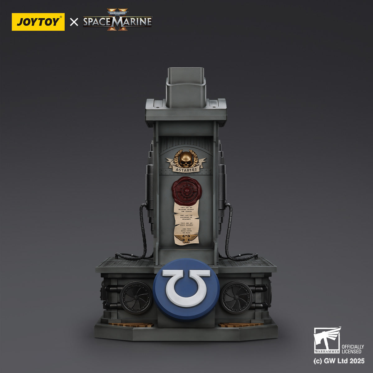 A grey Warhammer 40K display base featuring an Ultramarines symbol, Astartes skull emblem, and lore scrolls