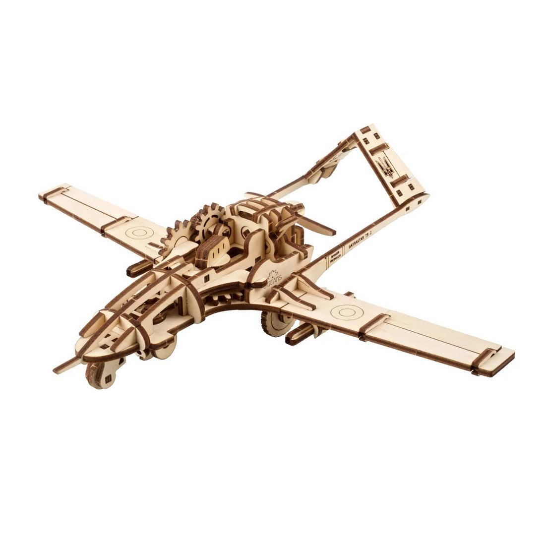 Intricate wooden model of a Bayraktar TB2 drone with visible gears and a Ukrainian trident on the tail
