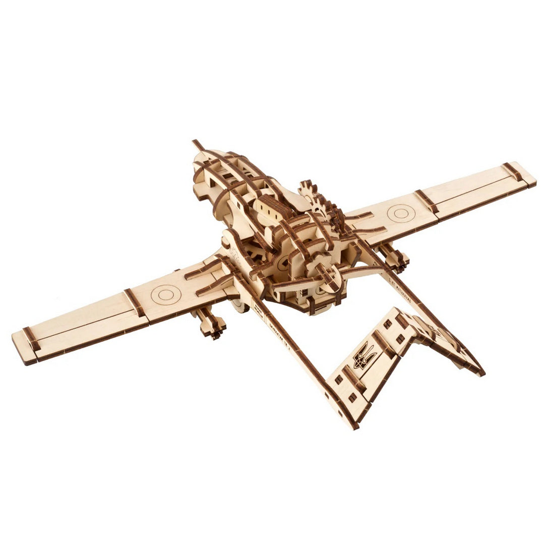 A light brown wooden puzzle model of an airplane, showcasing intricate interlocking pieces on a white background