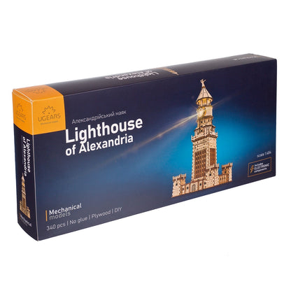 UGEARS Lighthouse of Alexandria mechanical model kit box, featuring the completed, lit-up wooden lighthouse