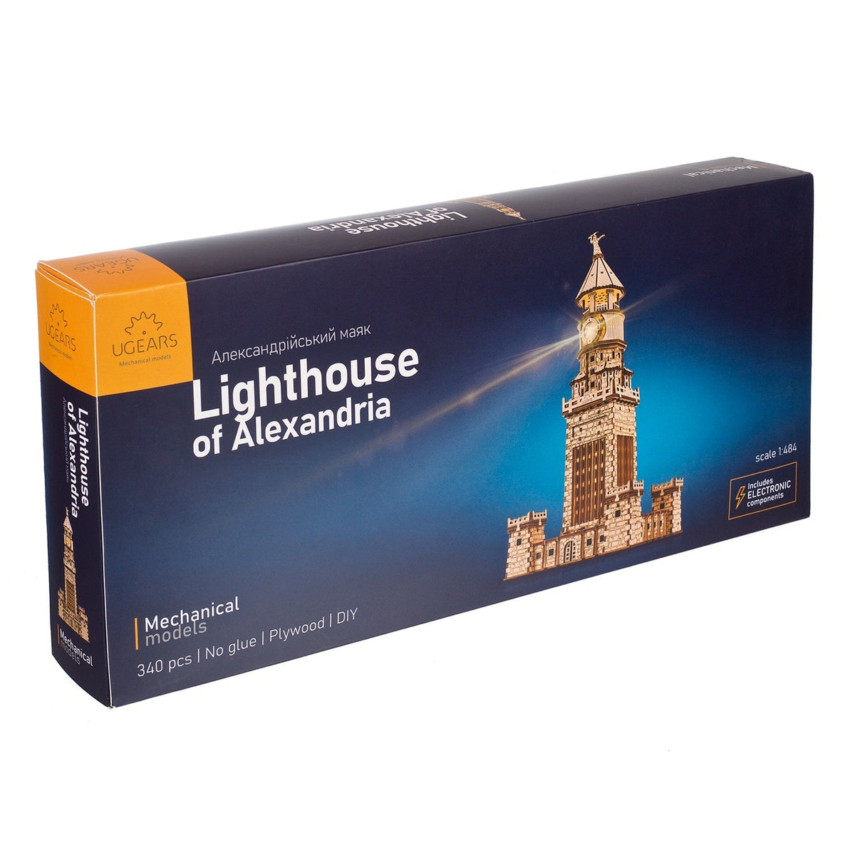UGEARS Lighthouse of Alexandria mechanical model kit box, featuring the completed, lit-up wooden lighthouse