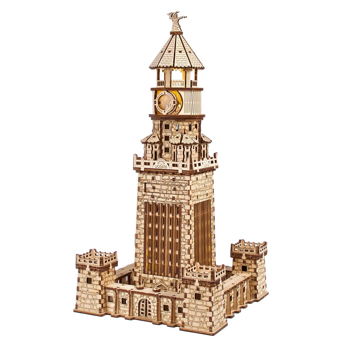 Detailed wooden model of the ancient Lighthouse of Alexandria, featuring a statue, clock face, and fortress base