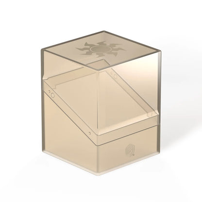 Translucent tan deck box for trading cards, featuring the Magic: The Gathering sunburst symbol on the lid