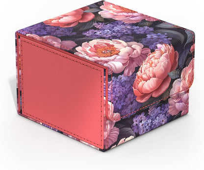 Box with pink peonies and purple flowers on a dark background; one side is textured coral with visible stitching