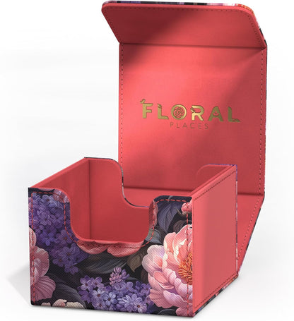 An open card deck box with a vibrant floral exterior and coral pink interior, displaying "FLORAL PLACES" on the lid