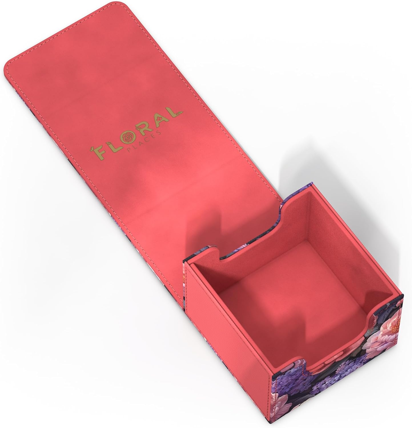 Open coral-red storage box with "FLORAL PLACES" on the lid and dark floral patterns, empty interior visible