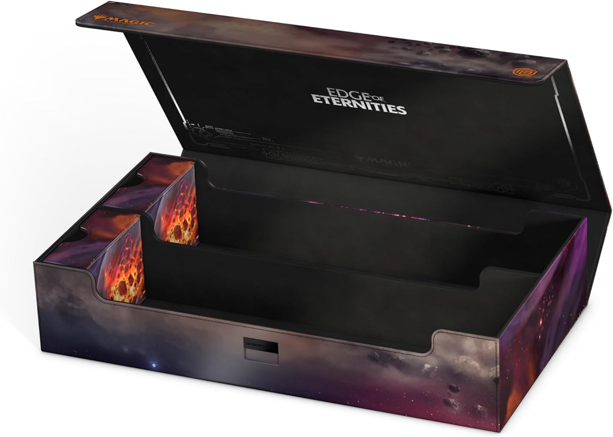 Open Magic card storage box with cosmic nebula design. Two small card boxes visible; main section empty. Lid says &#39;Edge of Eternities&#39;
