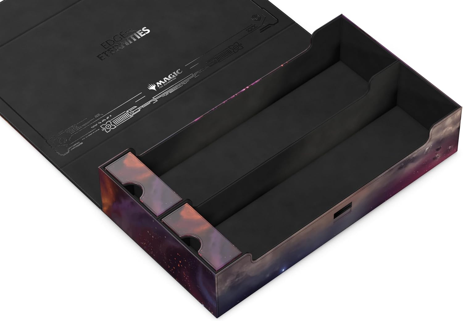 An open black Magic: The Gathering 'EDGES OF ETERNITIES' storage box with a vibrant nebula pattern on its sides and empty compartments