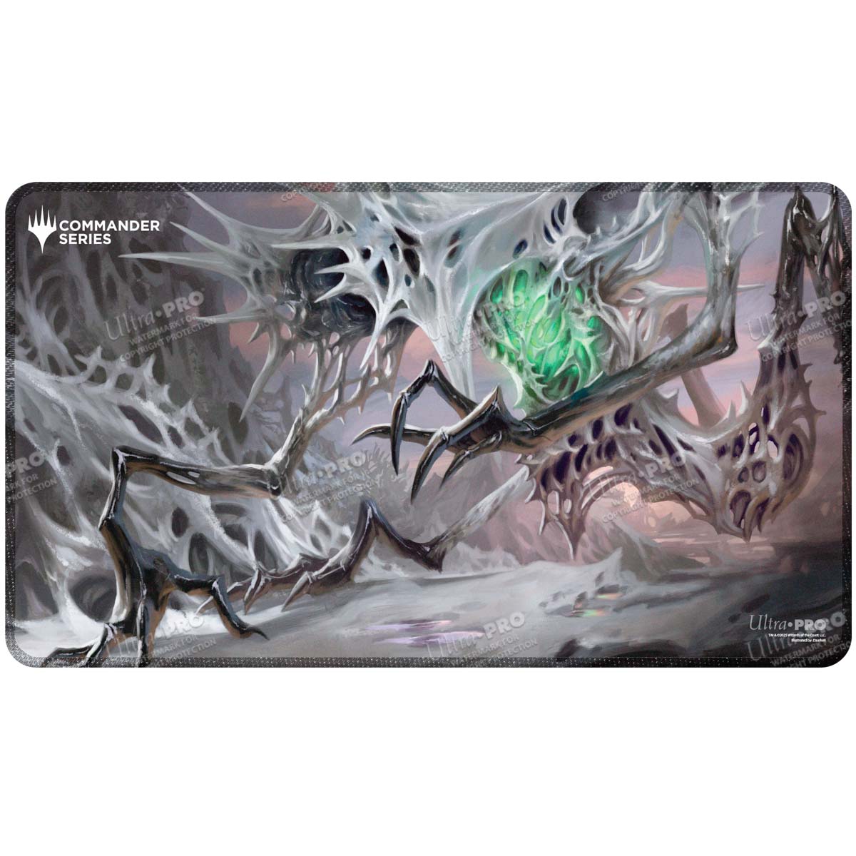 Magic: The Gathering Commander playmat featuring a white, skeletal, spider-like monster with a glowing green core and sharp claws on a barren landscape