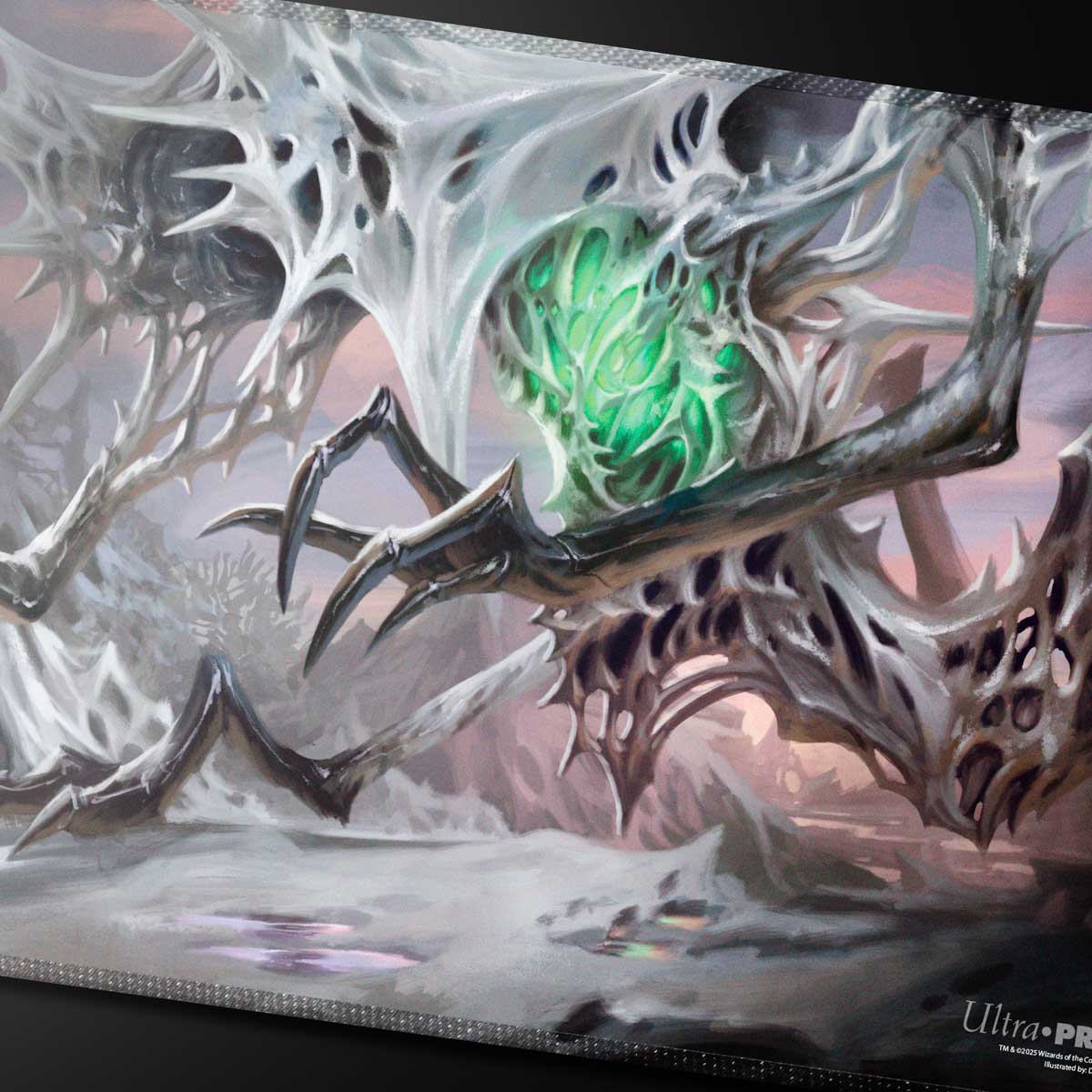 Magic: The Gathering Commander playmat  show a spiky, bone-like white monster with dark claws and a glowing green core in a desolate land