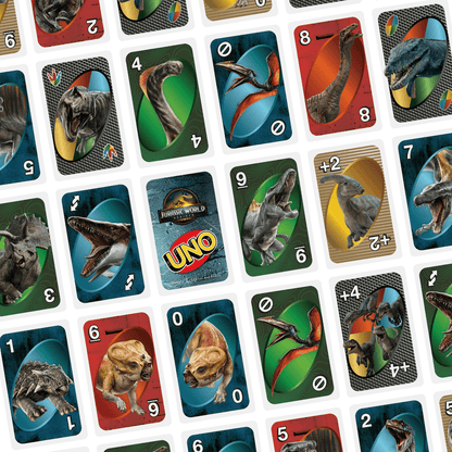 A spread of Jurassic World UNO cards, each featuring a dinosaur illustration, numbers, and special game symbols