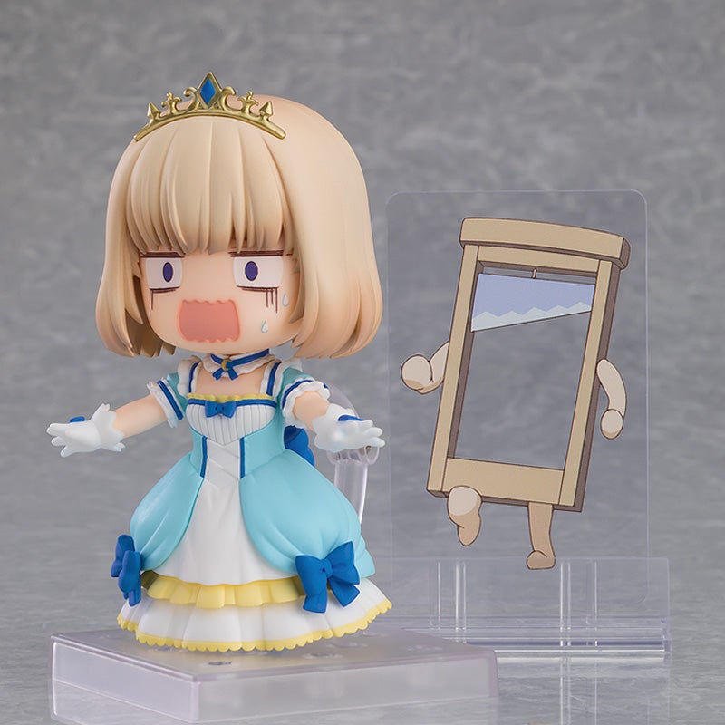 Figure of a blonde girl in a blue princess dress looking scared with a small guillotine figure behind her