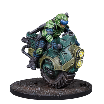 A sci-fi miniature of a soldier in green armor and a blue visor riding a dark green armored motorcycle