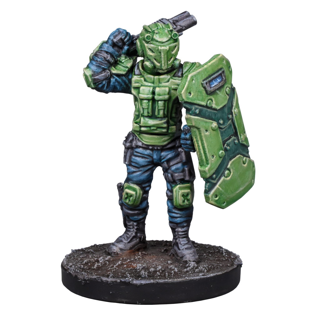 Green armored miniature soldier with a helmet, holding a large shield and weapon, standing on a base