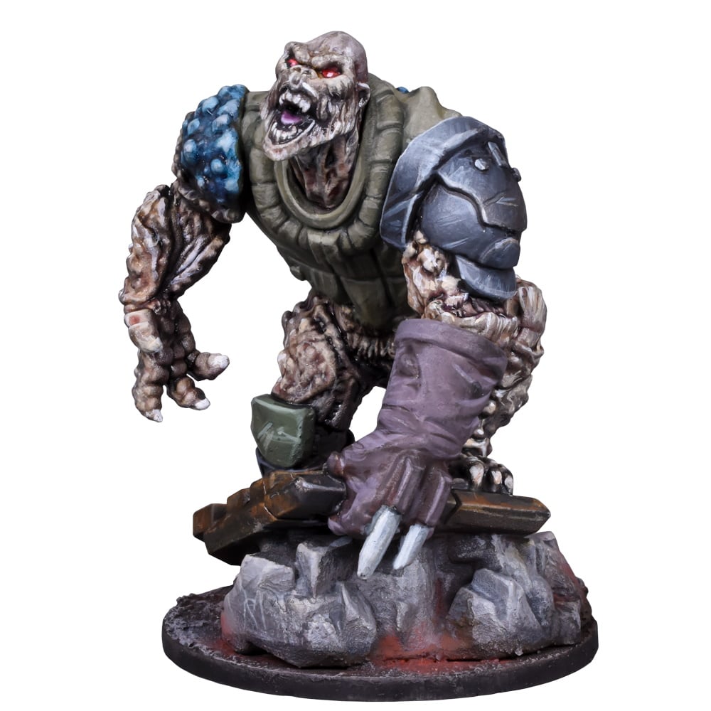 A miniature of a snarling, hulking monster with red eyes, sharp teeth, armored shoulders, on a rubble base
