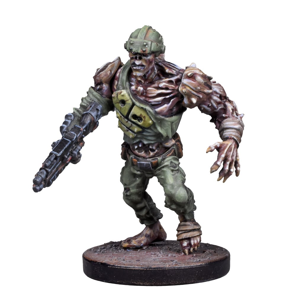 A miniature of a decaying, mutated soldier in a green uniform and helmet, holding a rifle