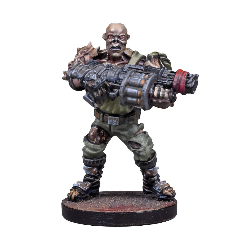 Miniature figure of a grotesque, pale-skinned mutant with red eyes, holding a heavy sci-fi weapon in a combat pose