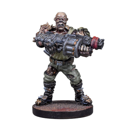 Miniature figure of a grotesque, pale-skinned mutant with red eyes, holding a heavy sci-fi weapon in a combat pose