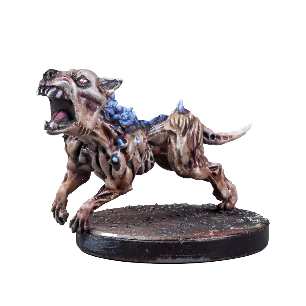 A painted miniature of an emaciated, mutated dog-like creature with blue growths and red eyes, snarling and lunging