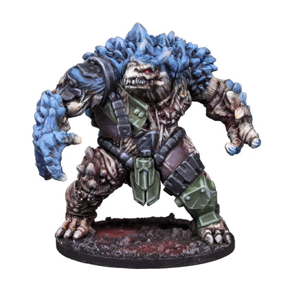 A detailed miniature of a large, brutish monster with blue crystalline growths, red eyes, and military armor, standing on a dark base