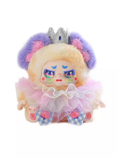 Fluffy art doll with cosmic eyes, a crown, and a pink tulle dress on white